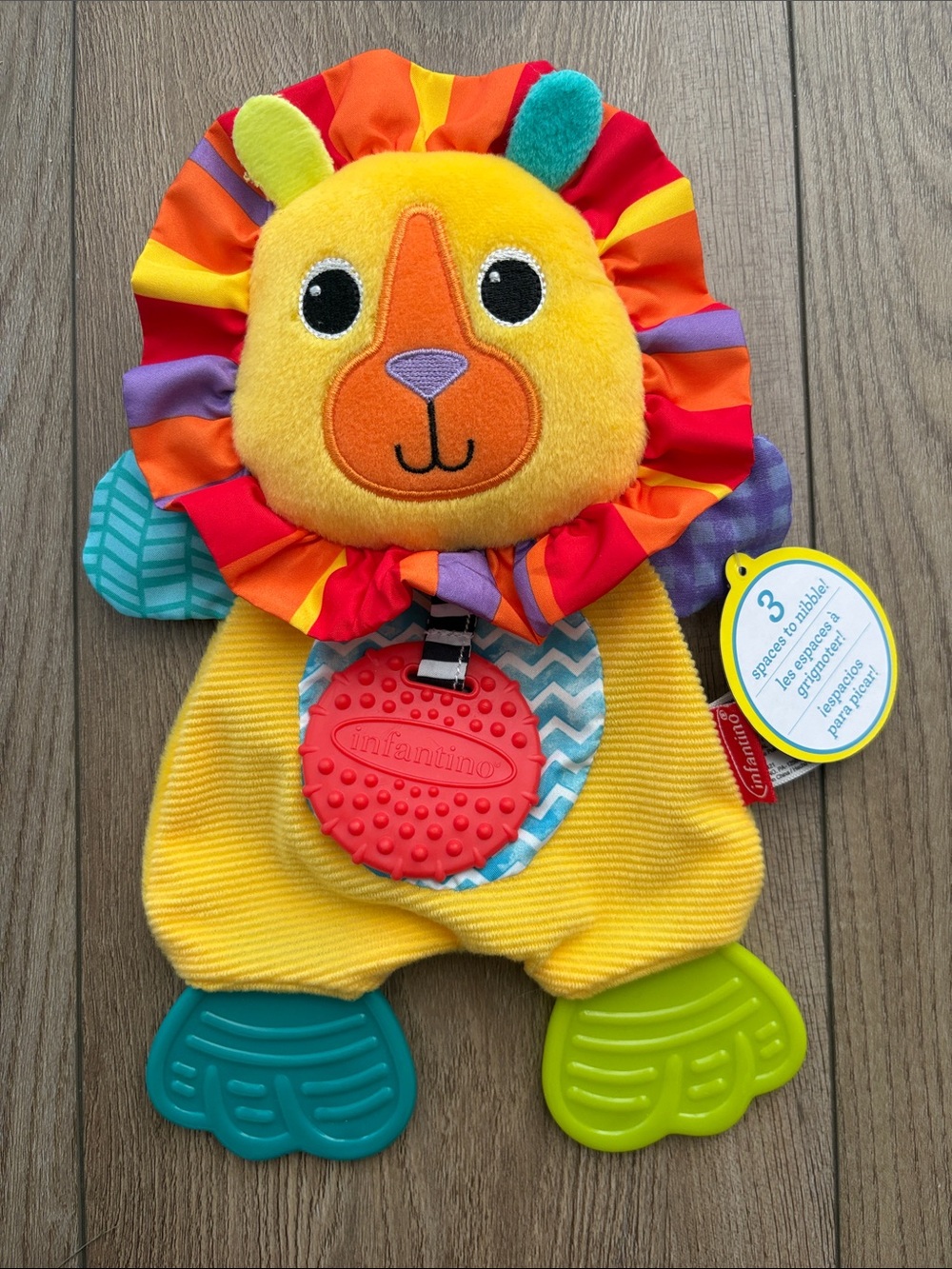 Infantino Yellow Plush Lion with Teal & Lime Foot Teethers